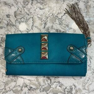 Melie Bianco studded turquoise teal clutch wallet with gold tassel